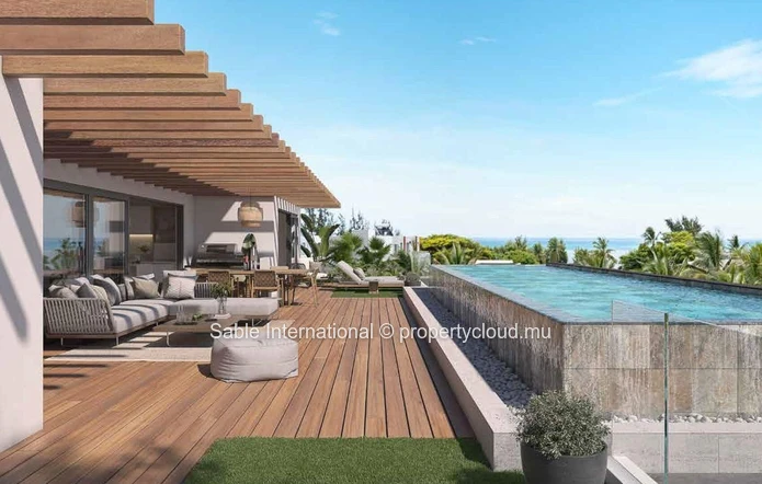 Appartement R+2 à vendre à Péreybère, 118m², 2 chambres, piscine commune, accès mer, proche commodités, cuisine équipée.