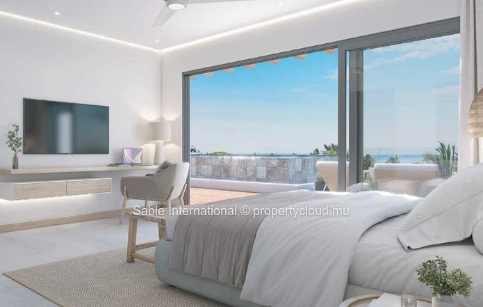 Appartement R+2 à vendre à Péreybère, 118m², 2 chambres, piscine commune, accès mer, proche commodités, cuisine équipée.