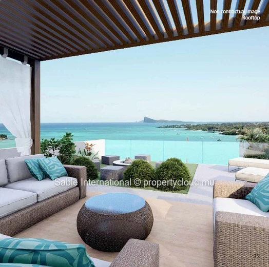 Appartement R+2 à vendre à Grand Baie, 140m², 3 chambres, piscine commune, vue mer, proche écoles et commerces.