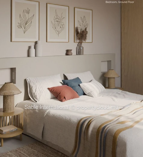 Appartement R+2 à vendre à Trou aux Biches, 122m², piscine commune, climatisé, proche écoles et commerces.