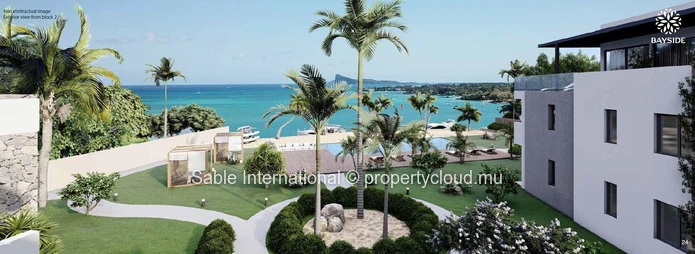 Appartement R+2 à vendre à Grand Baie, 140m², 3 chambres, piscine commune, vue mer, proche écoles et commerces.