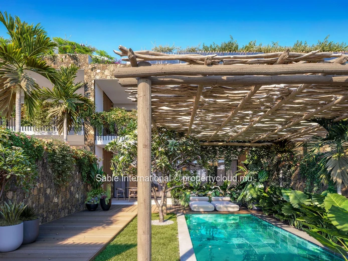 Appartement pieds dans l'eau à vendre à Calodyne, 119m², 3 chambres, piscine commune, vue mer