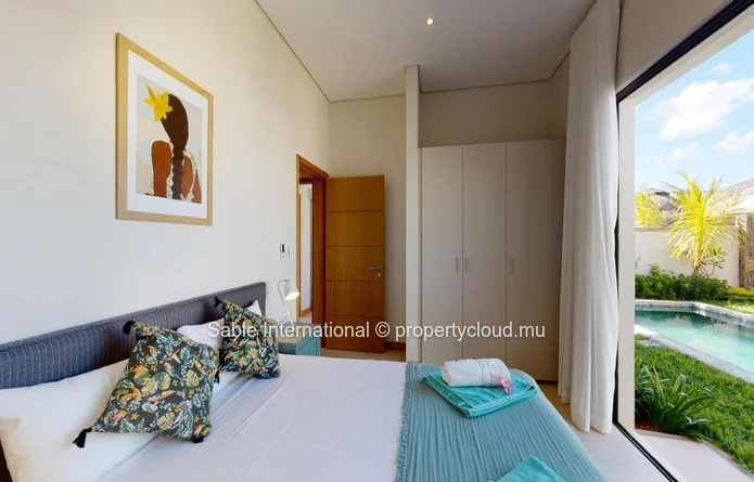 Villa à vendre à Grand Baie, 120m², 333m² terrain, 3 chambres, piscine privée, proche commodités. Meublé, climatisée.