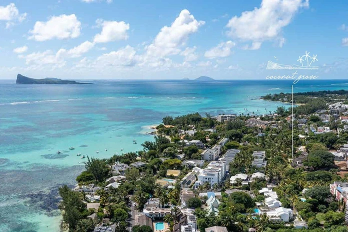 Appartement R+2 à vendre à Péreybère, 118m², 2 chambres, piscine commune, accès mer, proche commodités, cuisine équipée.