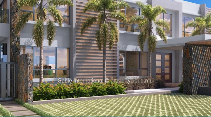 Penthouse R+2 à vendre à Pointe aux Canonniers, 149m², 3 chambres, piscine privée, vue mer, proche écoles et commerces.