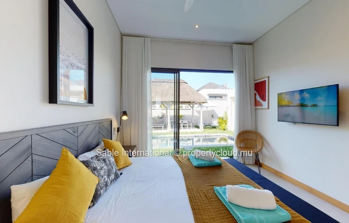 Villa à vendre à Grand Baie, 120m², 333m² terrain, 3 chambres, piscine privée, proche commodités. Meublé, climatisée.