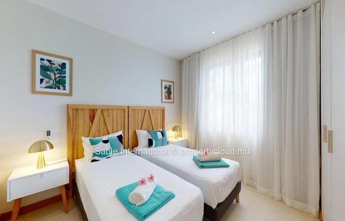 Villa à vendre à Grand Baie, 120m², 333m² terrain, 3 chambres, piscine privée, proche commodités. Meublé, climatisée.