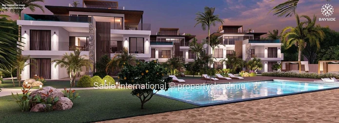Appartement R+2 à vendre à Grand Baie, 140m², 3 chambres, piscine commune, vue mer, proche écoles et commerces.