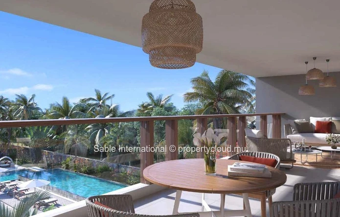 Appartement R+2 à vendre à Péreybère, 118m², 2 chambres, piscine commune, accès mer, proche commodités, cuisine équipée.
