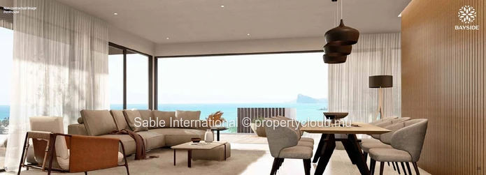 Appartement R+2 à vendre à Grand Baie, 140m², 3 chambres, piscine commune, vue mer, proche écoles et commerces.