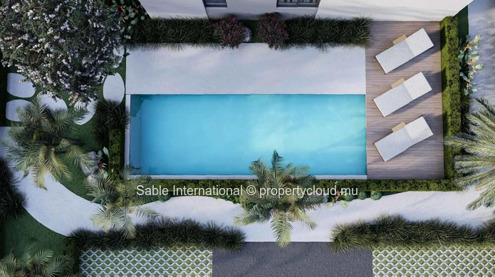 Appartement R+2 à vendre à Petit Raffray, Grand Baie. Surface habitable de 130m², 3 chambres, parking, piscine commune.