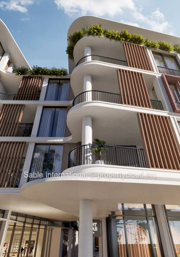 Appartement R+2 à vendre à Grand Baie, 152m², 3 chambres, vue mer, proche commodités, climatisé, ascenseur.